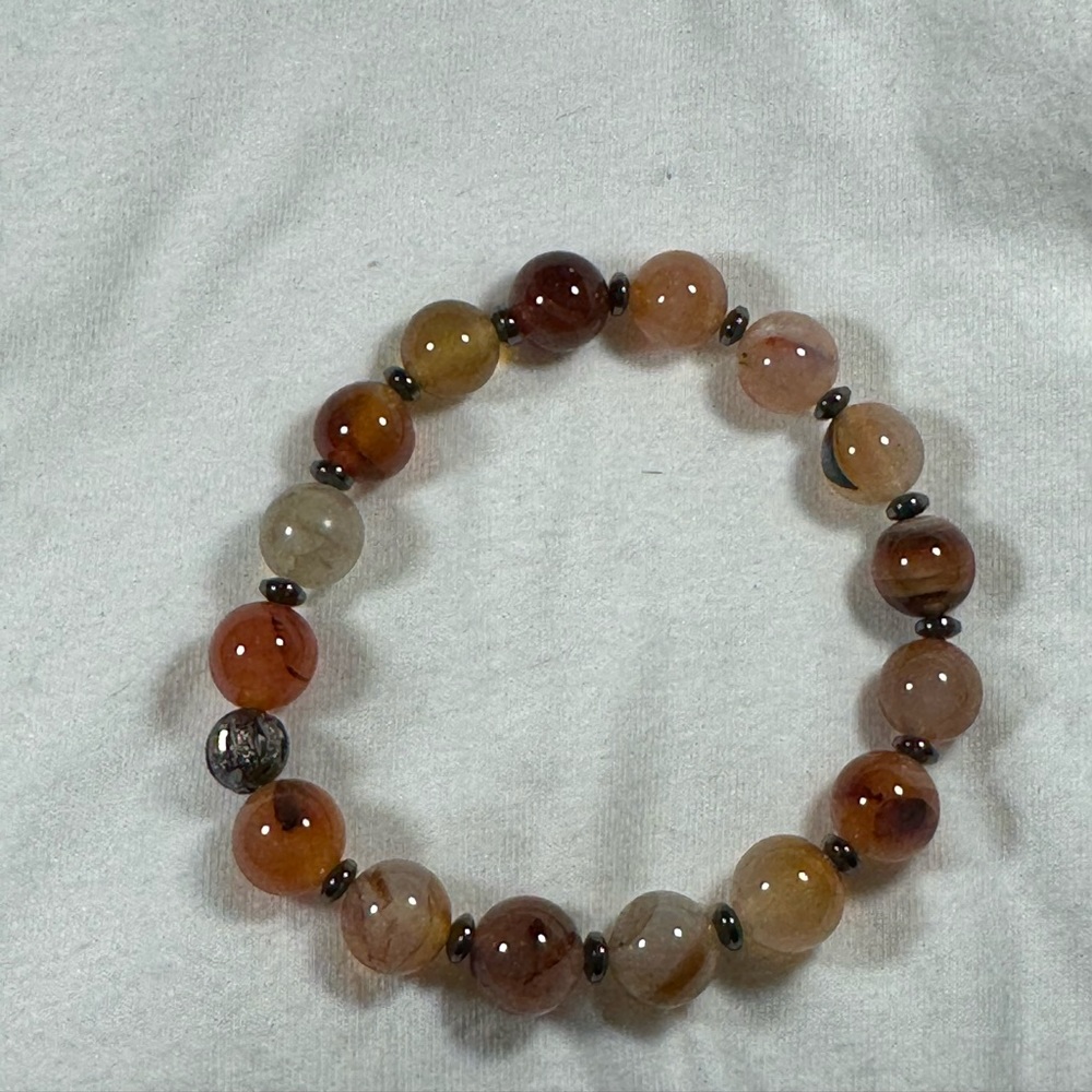 Marbled brown bead with gum metal accents